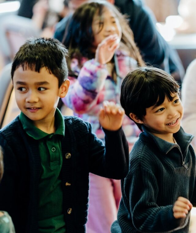 Children dancing and playing.