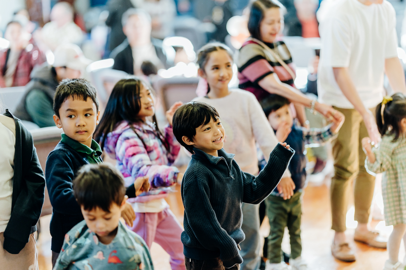 Children dancing and playing.
